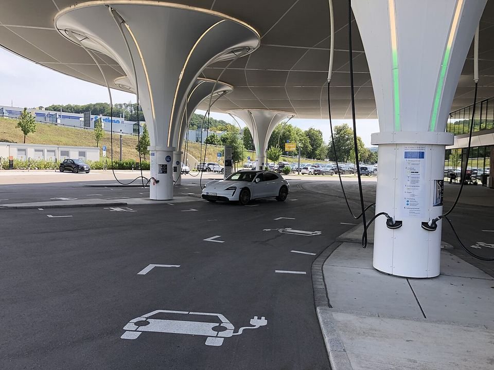 Public DC fast-charging station under a canopy